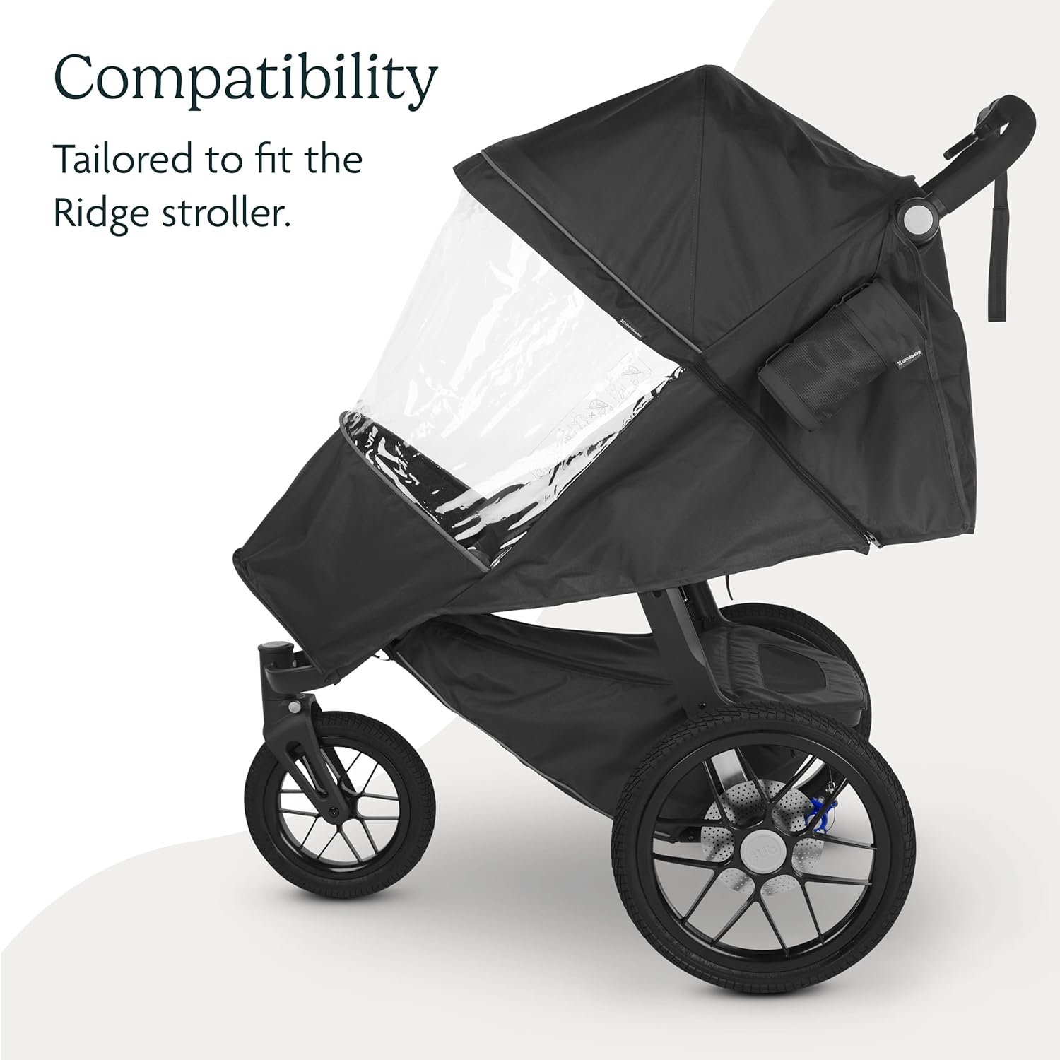 71Dp0u31zUL._SL1500_.jpg UPPAbaby Performance Rain Shield for Ridge/Waterproof and Windproof Coverage/Ventilated Design/Quick Attachment/Easy Access to Child - Image 4